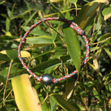 Perle de Tahiti sur un bracelet cordon paracorde ajustable en taille, bracelet style surfer