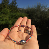 Perle de Tahiti sur un bracelet cordon paracorde ajustable en taille, bracelet style surfer