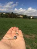 Collier Perle de Tahiti sur cordon argent brillant en coton japonais, longueur ajustable noeuds coulissants