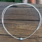 Collier Perle de Tahiti sur cordon argent brillant en coton japonais, longueur ajustable noeuds coulissants