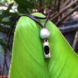Perle de Tahiti et Tiki tahitien sur cuir australien collier homme ou femme veritable perle de Tahiti silver et Tiki en argent massif