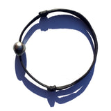 Perle noire de Tahiti, bracelet adaptable unisexe, cuir australien. Véritable perle noire de très bonne qualité.
