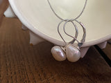 Tahitian pearl earrings on leather, solid silver