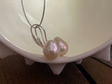 Tahitian pearl earrings on leather, solid silver