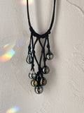 Collier unique 8 perles de Tahiti sur cuir noir tressé