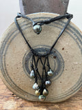 Collier unique 8 perles de Tahiti sur cuir noir tressé