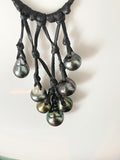 Collier unique 8 perles de Tahiti sur cuir noir tressé