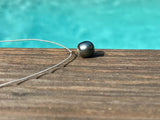 Collier perle de Tahiti sur soie japonaise grise, fermoir argent 925